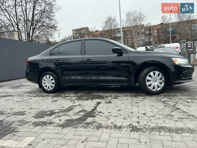 Чорний Фольксваген Джетта, об'ємом двигуна 1.4 л та пробігом 105 тис. км за 10999 $, фото 6 на Automoto.ua