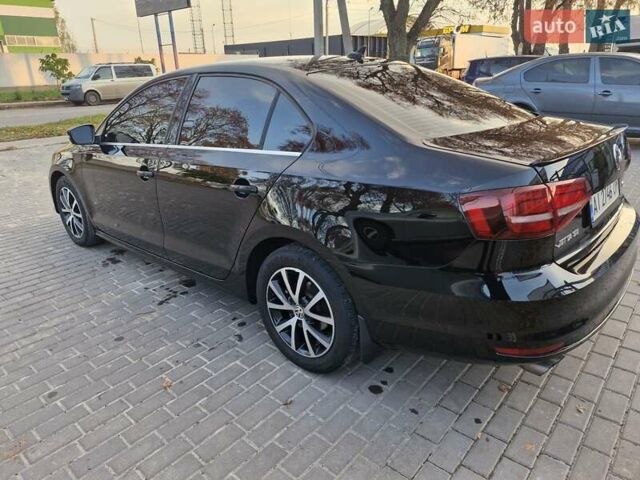 Чорний Фольксваген Джетта, об'ємом двигуна 1.4 л та пробігом 130 тис. км за 10700 $, фото 12 на Automoto.ua