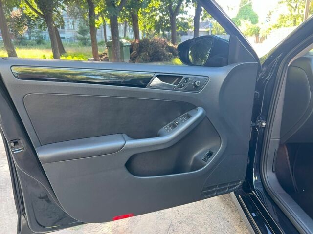 Черный Фольксваген Джетта, объемом двигателя 1.6 л и пробегом 214 тыс. км за 11740 $, фото 8 на Automoto.ua