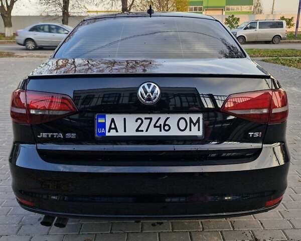 Чорний Фольксваген Джетта, об'ємом двигуна 1.4 л та пробігом 130 тис. км за 10700 $, фото 4 на Automoto.ua