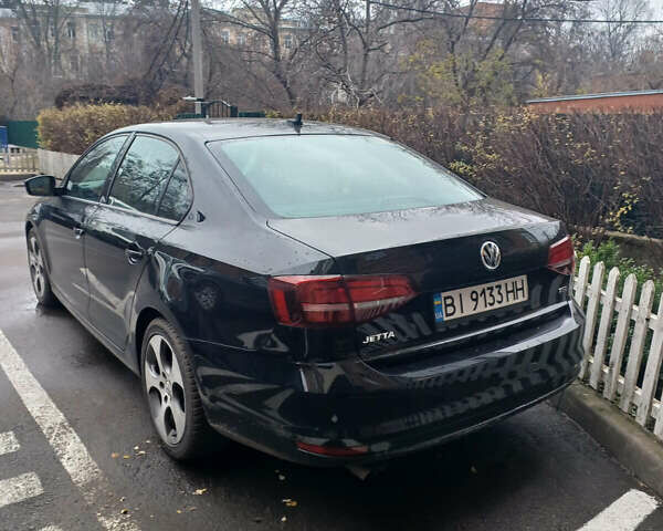 Черный Фольксваген Джетта, объемом двигателя 1.4 л и пробегом 99 тыс. км за 9800 $, фото 4 на Automoto.ua