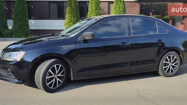 Черный Фольксваген Джетта, объемом двигателя 1.4 л и пробегом 147 тыс. км за 12000 $, фото 7 на Automoto.ua