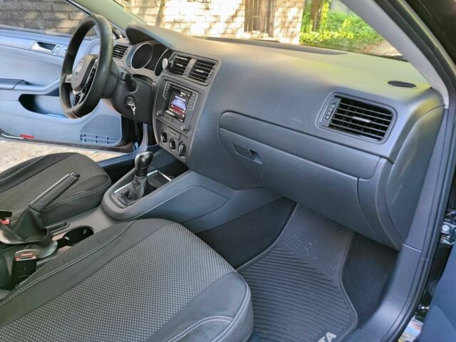 Черный Фольксваген Джетта, объемом двигателя 1.4 л и пробегом 140 тыс. км за 10399 $, фото 7 на Automoto.ua