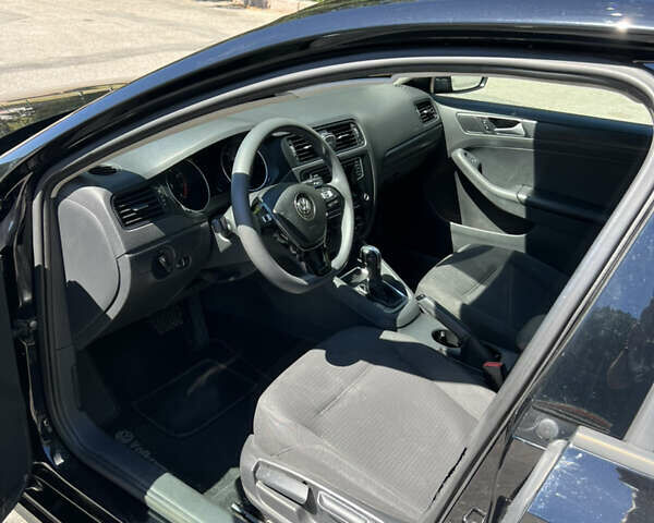 Черный Фольксваген Джетта, объемом двигателя 1.39 л и пробегом 150 тыс. км за 8500 $, фото 9 на Automoto.ua