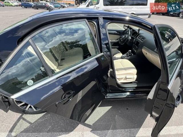 Чорний Фольксваген Джетта, об'ємом двигуна 1.4 л та пробігом 142 тис. км за 10500 $, фото 8 на Automoto.ua