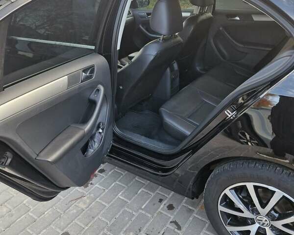 Чорний Фольксваген Джетта, об'ємом двигуна 1.4 л та пробігом 130 тис. км за 10700 $, фото 8 на Automoto.ua