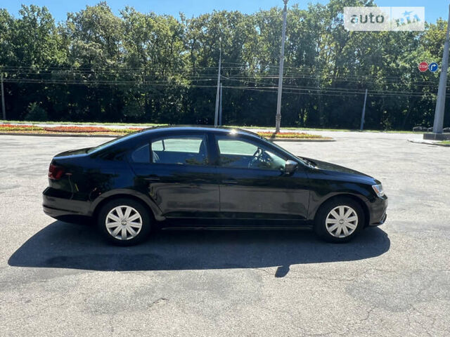 Черный Фольксваген Джетта, объемом двигателя 1.39 л и пробегом 150 тыс. км за 8500 $, фото 1 на Automoto.ua