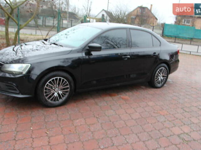 Черный Фольксваген Джетта, объемом двигателя 1.39 л и пробегом 211 тыс. км за 10800 $, фото 19 на Automoto.ua