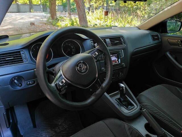 Черный Фольксваген Джетта, объемом двигателя 1.4 л и пробегом 140 тыс. км за 10399 $, фото 8 на Automoto.ua