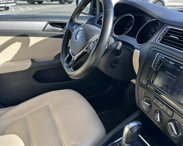 Фольксваген Джетта 2016 в Львове на Automoto.ua Черный Фольксваген Джетта, объемом двигателя 1.39 л и пробегом 121 тыс. км за 8500 $, фото 52 на Automoto.ua