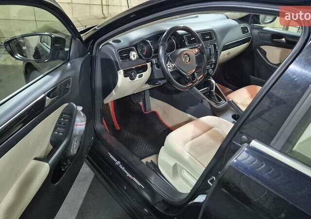 Чорний Фольксваген Джетта, об'ємом двигуна 1.6 л та пробігом 192 тис. км за 12200 $, фото 6 на Automoto.ua