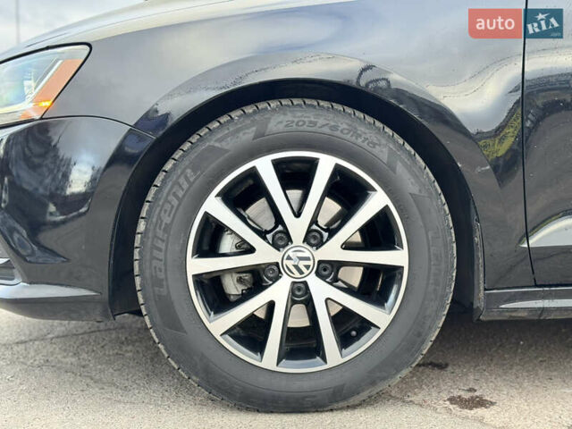 Черный Фольксваген Джетта, объемом двигателя 1.4 л и пробегом 80 тыс. км за 12200 $, фото 10 на Automoto.ua