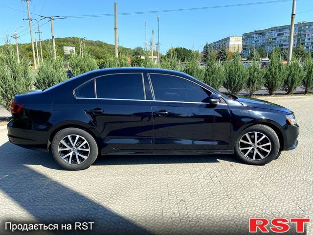 Черный Фольксваген Джетта, объемом двигателя 1.4 л и пробегом 143 тыс. км за 10900 $, фото 3 на Automoto.ua