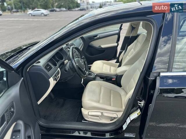 Чорний Фольксваген Джетта, об'ємом двигуна 1.4 л та пробігом 142 тис. км за 10500 $, фото 5 на Automoto.ua