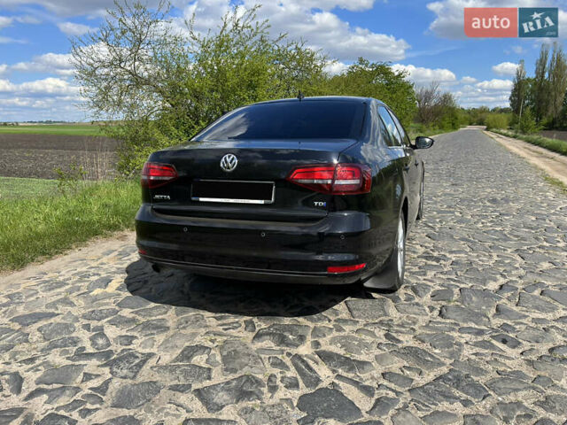 Черный Фольксваген Джетта, объемом двигателя 1.6 л и пробегом 164 тыс. км за 10900 $, фото 4 на Automoto.ua