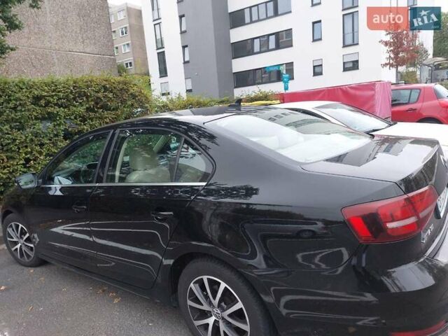 Чорний Фольксваген Джетта, об'ємом двигуна 1.4 л та пробігом 105 тис. км за 10673 $, фото 9 на Automoto.ua