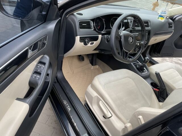 Черный Фольксваген Джетта, объемом двигателя 1.6 л и пробегом 175 тыс. км за 10777 $, фото 16 на Automoto.ua