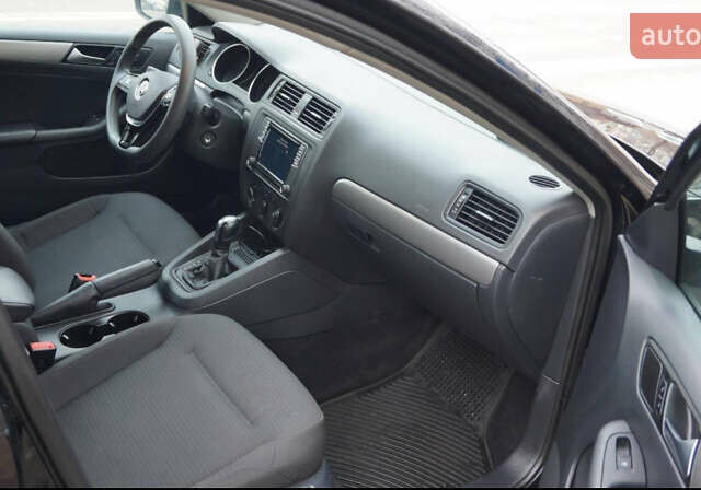 Чорний Фольксваген Джетта, об'ємом двигуна 1.4 л та пробігом 130 тис. км за 10600 $, фото 6 на Automoto.ua