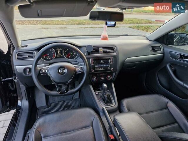 Чорний Фольксваген Джетта, об'ємом двигуна 1.4 л та пробігом 130 тис. км за 10700 $, фото 7 на Automoto.ua