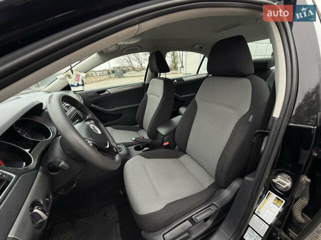 Черный Фольксваген Джетта, объемом двигателя 1.4 л и пробегом 139 тыс. км за 10800 $, фото 26 на Automoto.ua