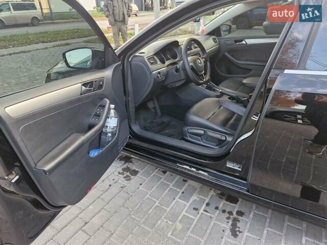 Чорний Фольксваген Джетта, об'ємом двигуна 1.4 л та пробігом 130 тис. км за 10700 $, фото 5 на Automoto.ua