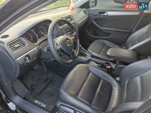 Чорний Фольксваген Джетта, об'ємом двигуна 1.4 л та пробігом 130 тис. км за 10700 $, фото 13 на Automoto.ua