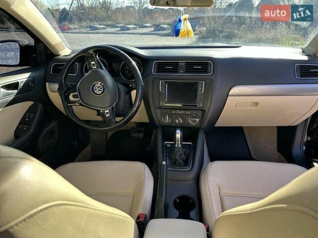 Черный Фольксваген Джетта, объемом двигателя 1.4 л и пробегом 138 тыс. км за 10400 $, фото 37 на Automoto.ua