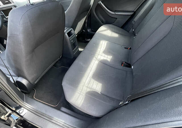 Чорний Фольксваген Джетта, об'ємом двигуна 1.4 л та пробігом 220 тис. км за 9400 $, фото 11 на Automoto.ua