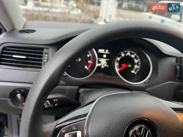 Чорний Фольксваген Джетта, об'ємом двигуна 1.4 л та пробігом 105 тис. км за 10999 $, фото 10 на Automoto.ua