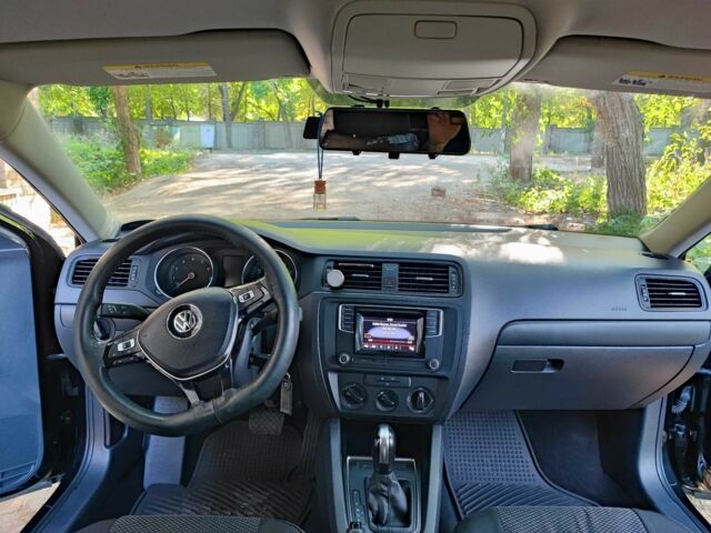 Черный Фольксваген Джетта, объемом двигателя 1.4 л и пробегом 140 тыс. км за 10399 $, фото 4 на Automoto.ua