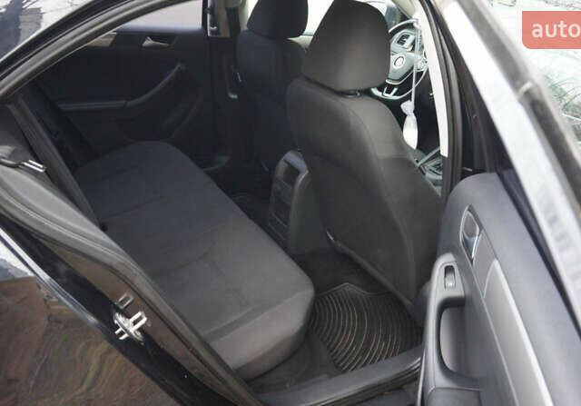 Чорний Фольксваген Джетта, об'ємом двигуна 1.4 л та пробігом 130 тис. км за 10600 $, фото 7 на Automoto.ua