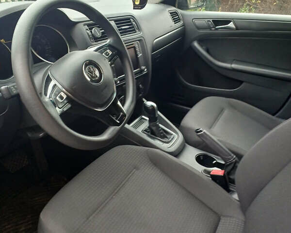 Черный Фольксваген Джетта, объемом двигателя 1.4 л и пробегом 99 тыс. км за 9800 $, фото 6 на Automoto.ua