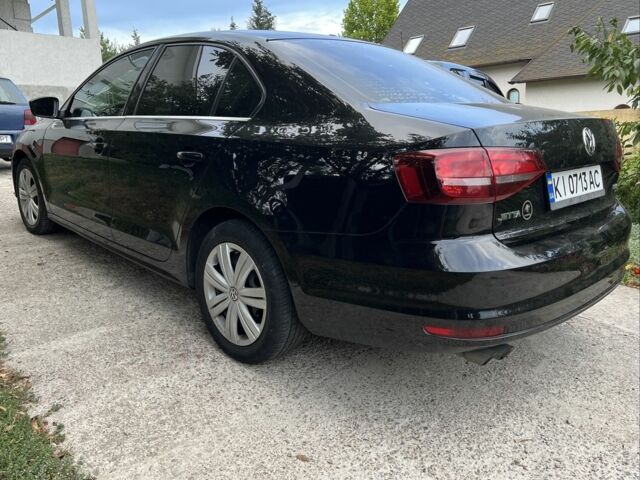 Чорний Фольксваген Джетта, об'ємом двигуна 1.4 л та пробігом 112 тис. км за 10800 $, фото 4 на Automoto.ua