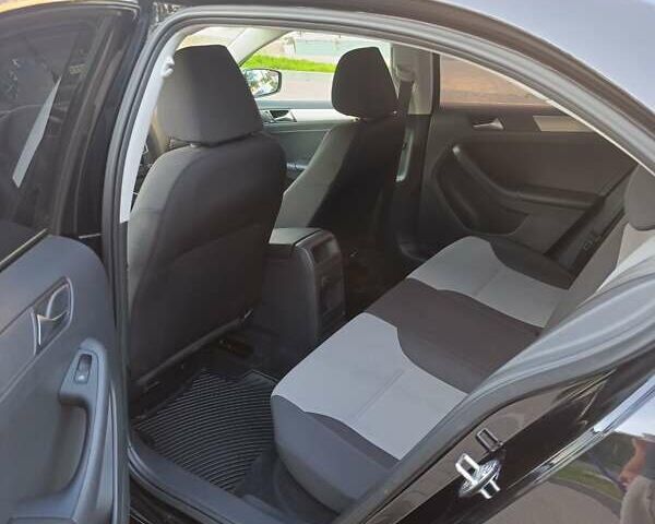 Черный Фольксваген Джетта, объемом двигателя 1.4 л и пробегом 68 тыс. км за 12500 $, фото 13 на Automoto.ua