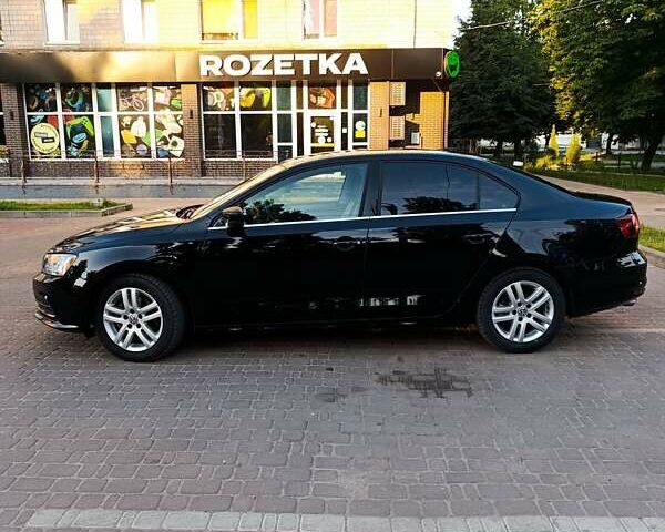 Черный Фольксваген Джетта, объемом двигателя 1.4 л и пробегом 68 тыс. км за 12500 $, фото 6 на Automoto.ua