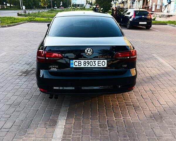 Черный Фольксваген Джетта, объемом двигателя 1.4 л и пробегом 68 тыс. км за 12500 $, фото 7 на Automoto.ua