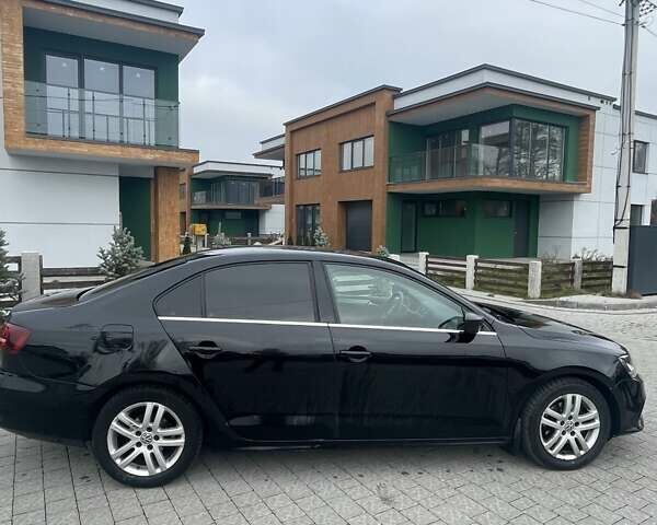 Черный Фольксваген Джетта, объемом двигателя 1.4 л и пробегом 200 тыс. км за 9700 $, фото 1 на Automoto.ua