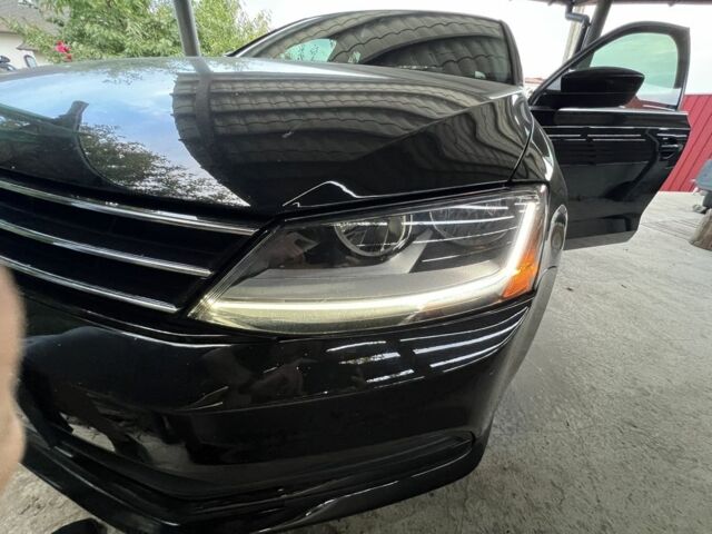 Чорний Фольксваген Джетта, об'ємом двигуна 1.4 л та пробігом 112 тис. км за 10800 $, фото 5 на Automoto.ua