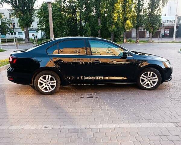 Черный Фольксваген Джетта, объемом двигателя 1.4 л и пробегом 68 тыс. км за 12500 $, фото 5 на Automoto.ua