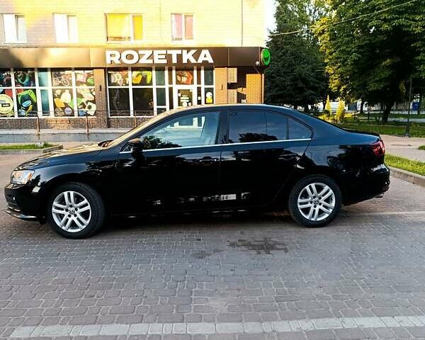 Черный Фольксваген Джетта, объемом двигателя 1.4 л и пробегом 68 тыс. км за 12500 $, фото 4 на Automoto.ua