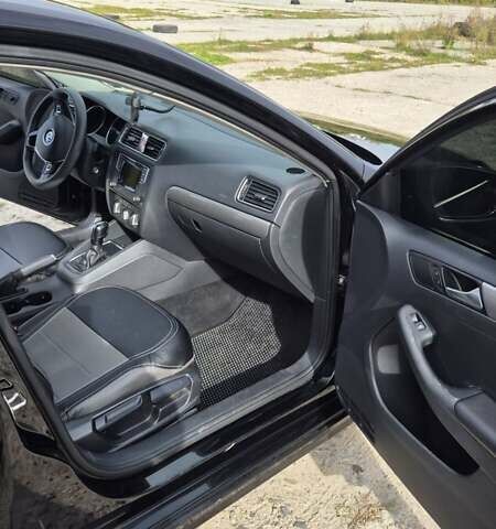 Чорний Фольксваген Джетта, об'ємом двигуна 1.4 л та пробігом 90 тис. км за 10700 $, фото 13 на Automoto.ua