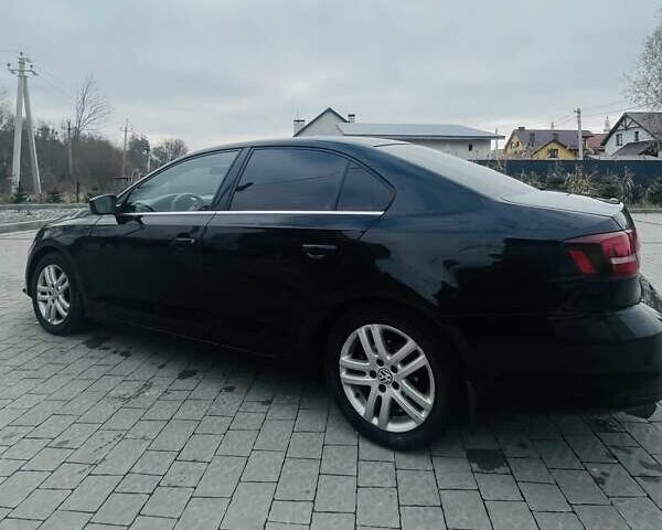 Черный Фольксваген Джетта, объемом двигателя 1.4 л и пробегом 200 тыс. км за 9700 $, фото 6 на Automoto.ua