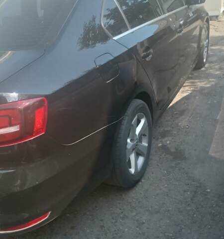 Черный Фольксваген Джетта, объемом двигателя 1.4 л и пробегом 113 тыс. км за 10000 $, фото 5 на Automoto.ua