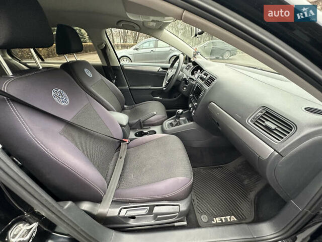 Черный Фольксваген Джетта, объемом двигателя 1.4 л и пробегом 175 тыс. км за 8999 $, фото 18 на Automoto.ua