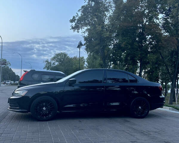 Черный Фольксваген Джетта, объемом двигателя 1.4 л и пробегом 105 тыс. км за 9500 $, фото 2 на Automoto.ua