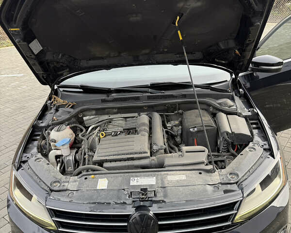 Черный Фольксваген Джетта, объемом двигателя 1.4 л и пробегом 151 тыс. км за 11000 $, фото 44 на Automoto.ua