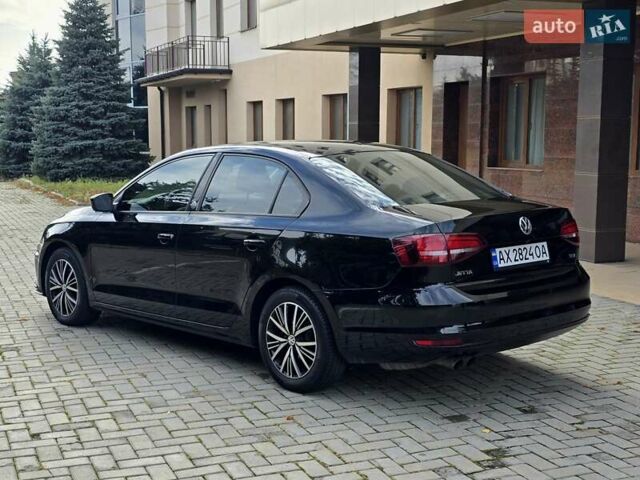 Черный Фольксваген Джетта, объемом двигателя 1.4 л и пробегом 126 тыс. км за 8900 $, фото 6 на Automoto.ua