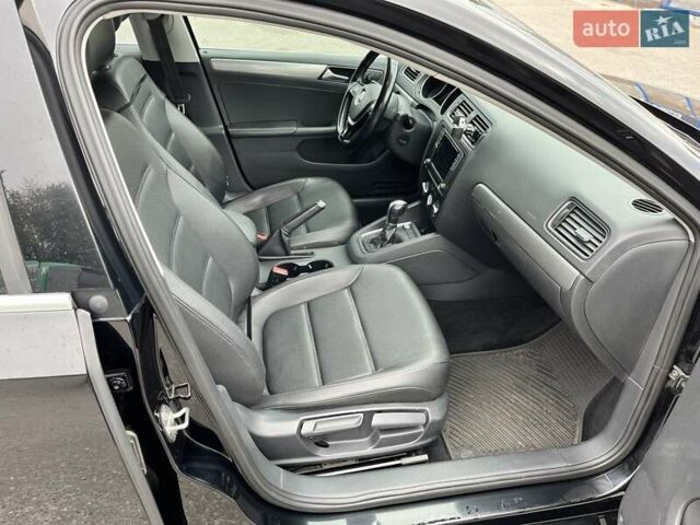 Фольксваген Джетта 2017 в Днепре (Днепропетровске) на Automoto.ua Черный Фольксваген Джетта, объемом двигателя 1.4 л и пробегом 125 тыс. км за 13000 $, фото 18 на Automoto.ua