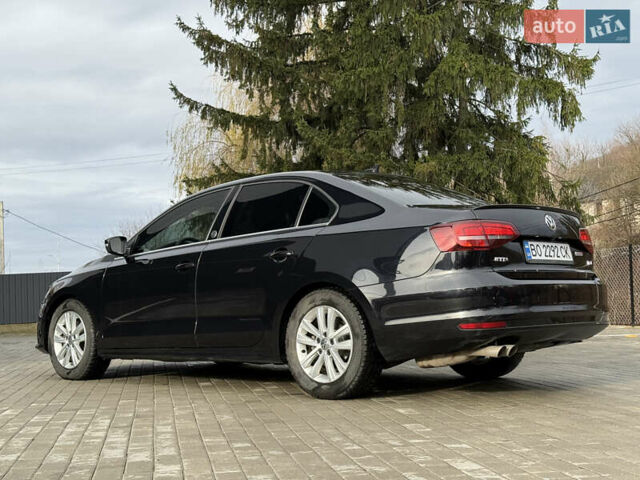 Черный Фольксваген Джетта, объемом двигателя 1.4 л и пробегом 151 тыс. км за 11000 $, фото 3 на Automoto.ua