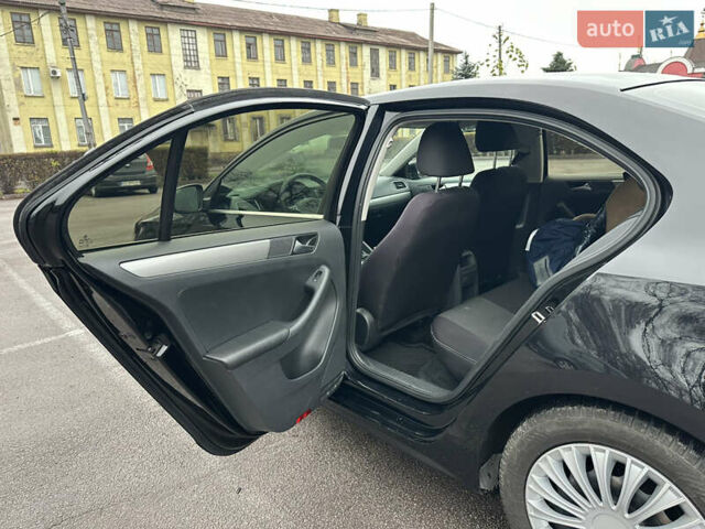 Черный Фольксваген Джетта, объемом двигателя 1.4 л и пробегом 175 тыс. км за 8999 $, фото 16 на Automoto.ua